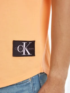 Calvin Klein Jeans Shirts*BADGE ROUND HEM TEE crushed orange